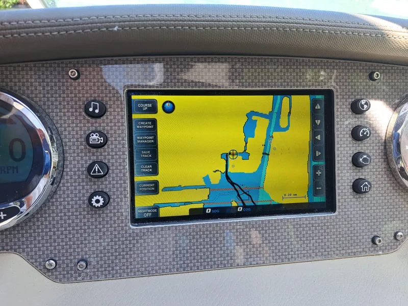 Slide: The Image of Dashboard of a 2014 Regal 2700 Bowrider with GPS navigation screen. - 40