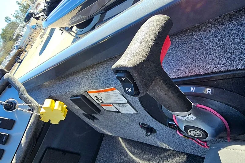 Slide: The Image of 2022 Ranger RT188 boat control panel with throttle and ignition key. - 14