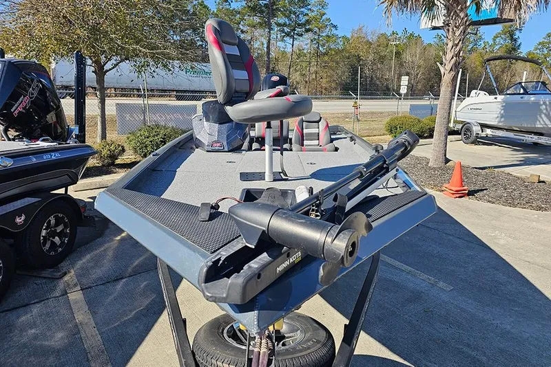 Slide: The Image of 2022 Ranger RT188 fishing boat with Minn Kota trolling motor, parked outdoors. - 5