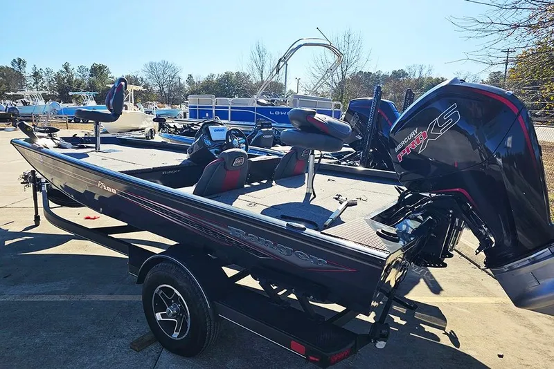 Slide: The Image of 2022 Ranger RT188 boat with Mercury Pro XS engine in a sunny outdoor setting. - 8