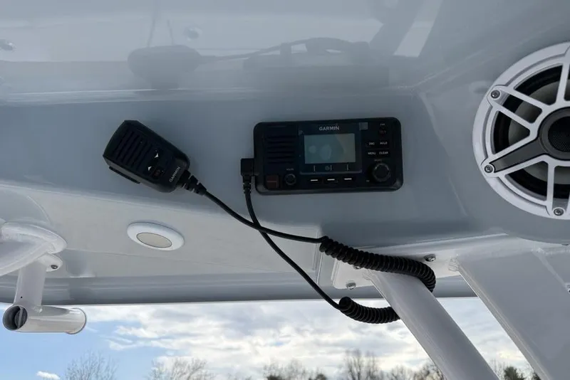 Slide: The Image of 2026 Sportsman Heritage 261 Center Console with Garmin radio and speaker system. - 30