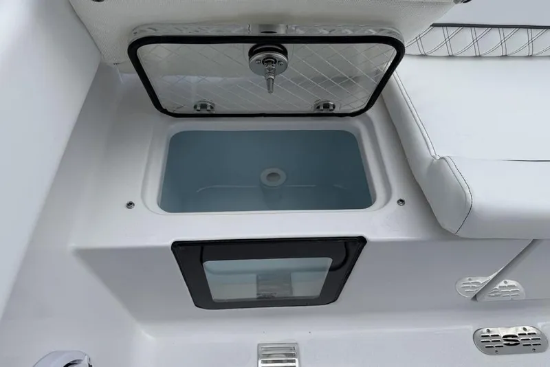 Slide: The Image of Livewell compartment on 2026 Sportsman Heritage 261 Center Console boat. - 34