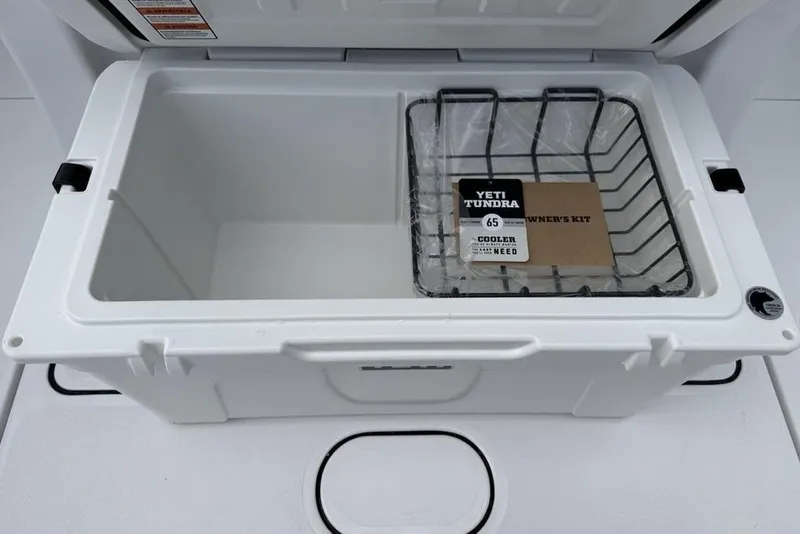 Slide: The Image of Open Yeti Tundra cooler on Sportsman Heritage 261 Center Console, 2026 model. - 40