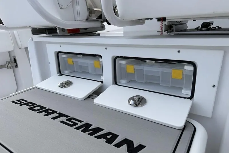 Slide: The Image of Storage compartments on 2026 Sportsman Heritage 261 Center Console boat interior. - 43