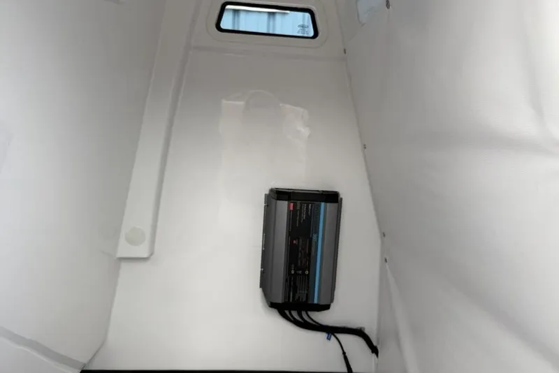 Slide: The Image of Interior of 2026 Sportsman Heritage 261 Center Console with mounted electronic device. - 49