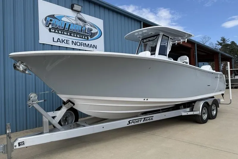 Slide: The Image of 2026 Sportsman Heritage 261 Center Console boat on trailer at Foothills Marine Center. - 5