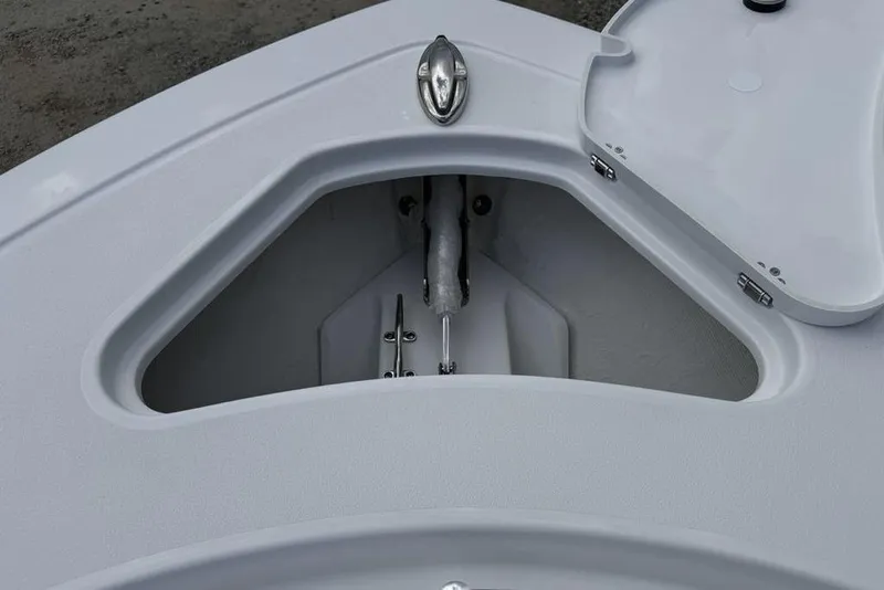 Slide: The Image of Anchor storage compartment on 2026 Sportsman Heritage 261 Center Console boat. - 7