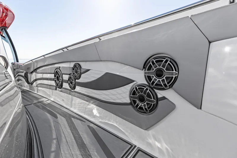 Slide: The Image of 2024 MTI V42 boat interior with sleek design and integrated speakers. - 42