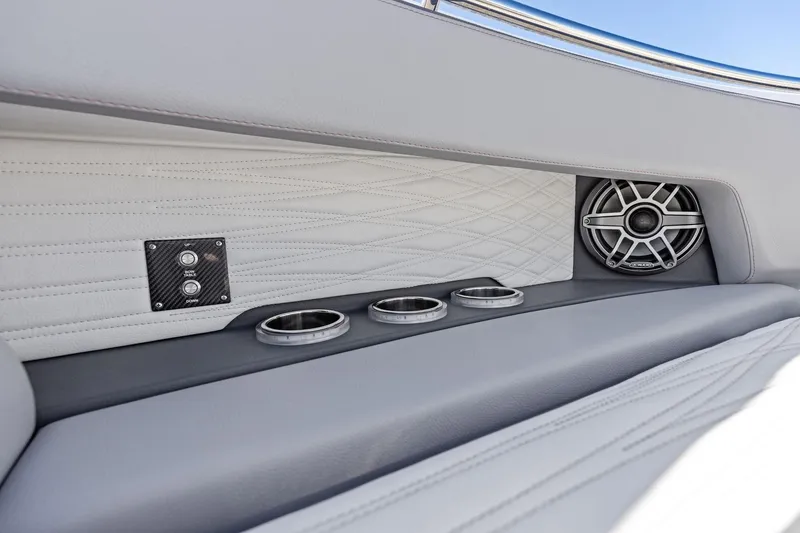 Slide: The Image of Luxury interior of 2024 MTI V42 boat with speaker and cup holders. - 43