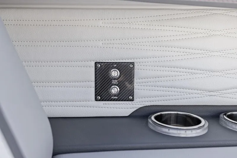 Slide: The Image of 2024 MTI V42 interior with carbon fiber panel and cup holders. - 44