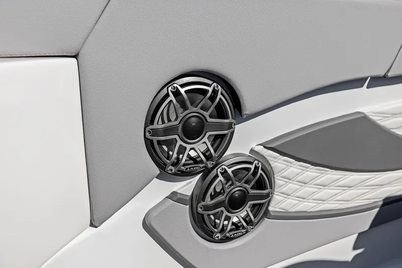 Slide: The Image of 2024 MTI V42 boat interior with dual JL Audio speakers, featuring sleek gray and white design. - 50