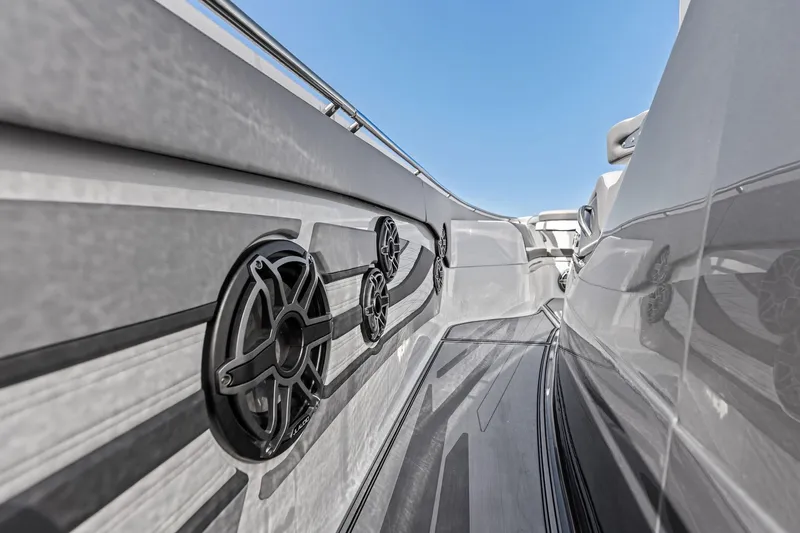 Slide: The Image of 2024 MTI V42 boat interior with sleek design and high-quality speakers. - 52