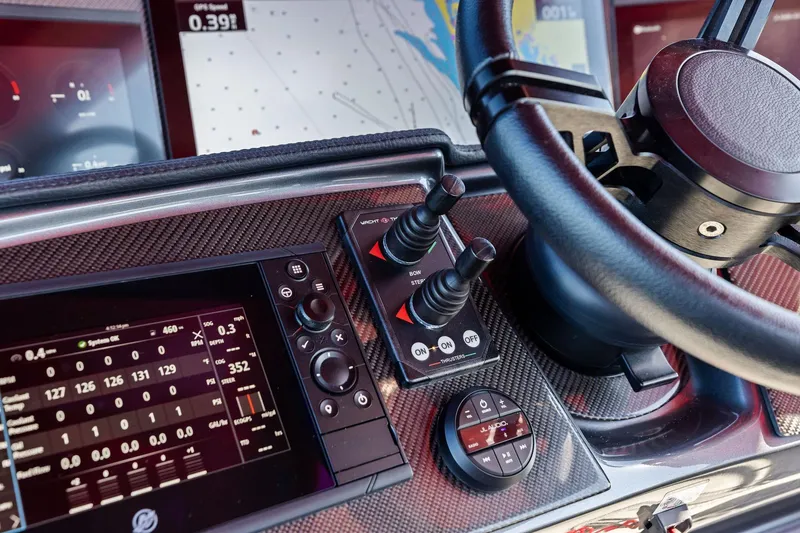 Slide: The Image of Dashboard of 2024 MTI V42 boat with advanced navigation controls and displays. - 67
