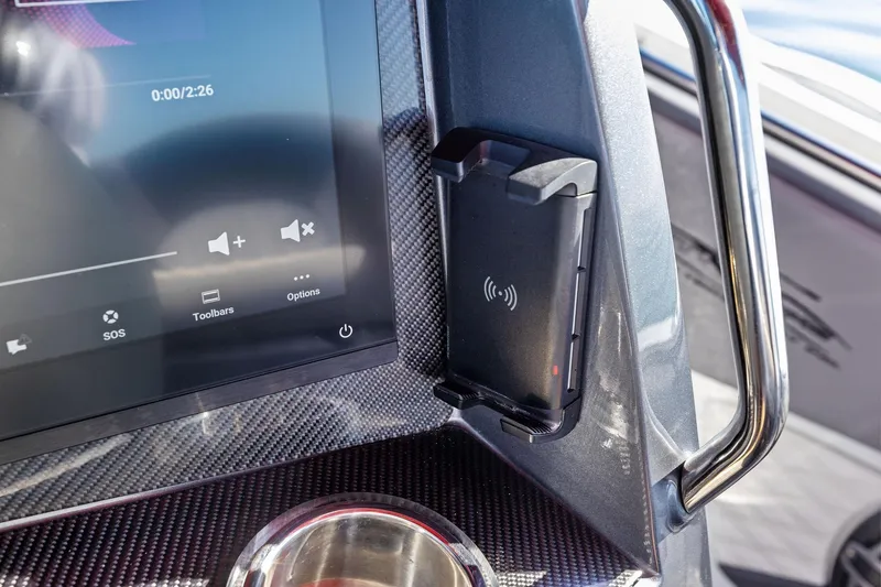 Slide: The Image of 2024 MTI V42 dashboard with touchscreen and wireless charging dock. - 69