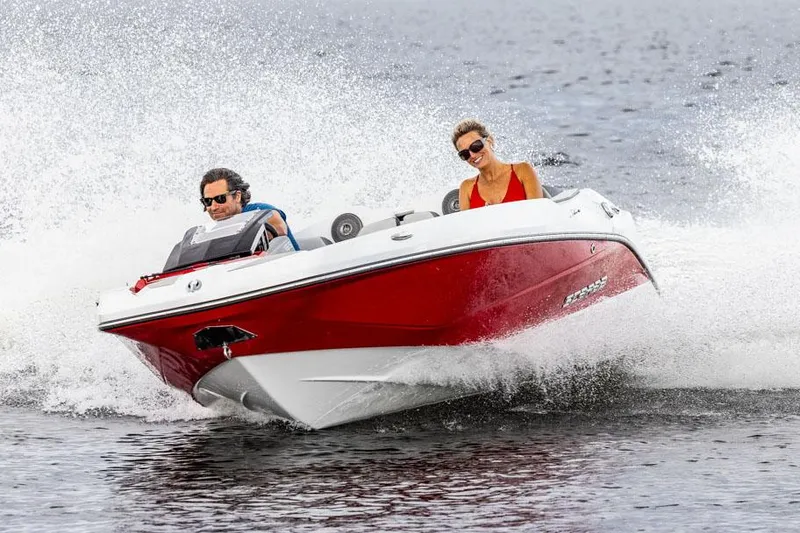 The Image of Manufacturer Provided Image: Scarab 165 LX 2026 boat on water with two people. - 0