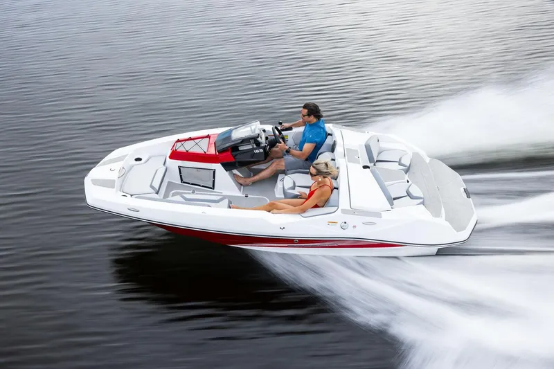 Slide: The Image of Manufacturer Provided Image: Scarab 165 LX 2026 on water, two people onboard. - 2