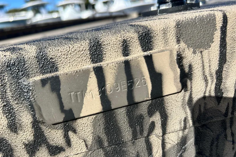 Slide: The Image of 2025 Havoc 1860 Dbst boat with camouflage pattern and visible serial number. - 13