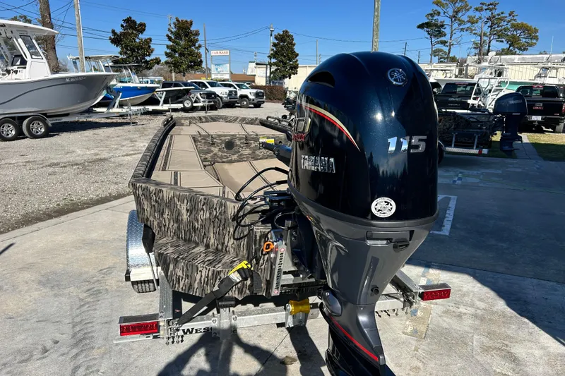 Slide: The Image of 2025 Havoc 1860 Dbst boat with Yamaha 115 outboard motor on trailer. - 4