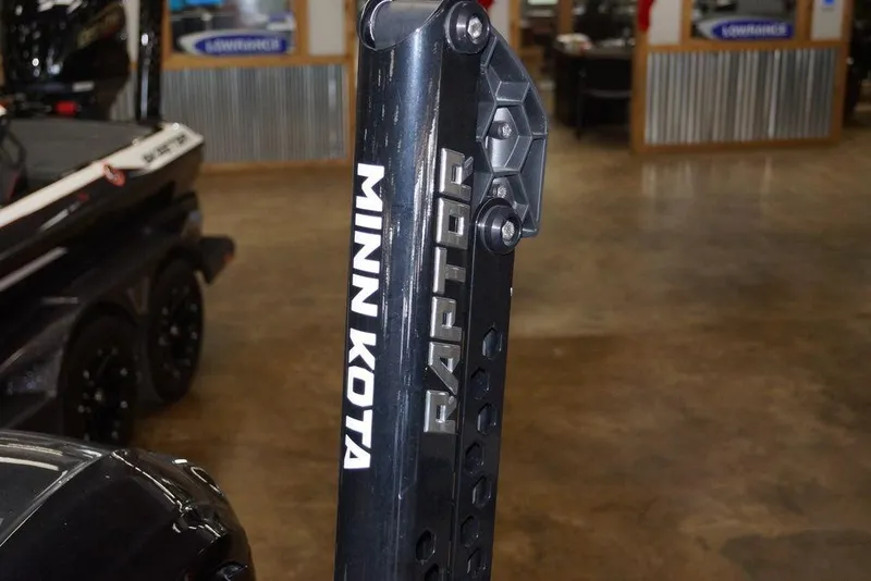 Slide: The Image of Minn Kota Raptor on 2026 Skeeter FXR20 FLEX boat in showroom. - 11