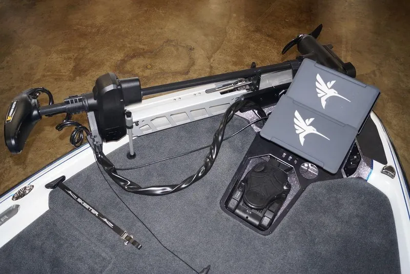 Slide: The Image of 2026 Skeeter FXR20 FLEX boat deck with trolling motor and control panel. - 25