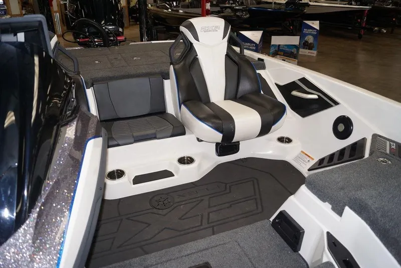Slide: The Image of 2026 Skeeter FXR20 FLEX boat interior with sleek seating and modern design. - 26