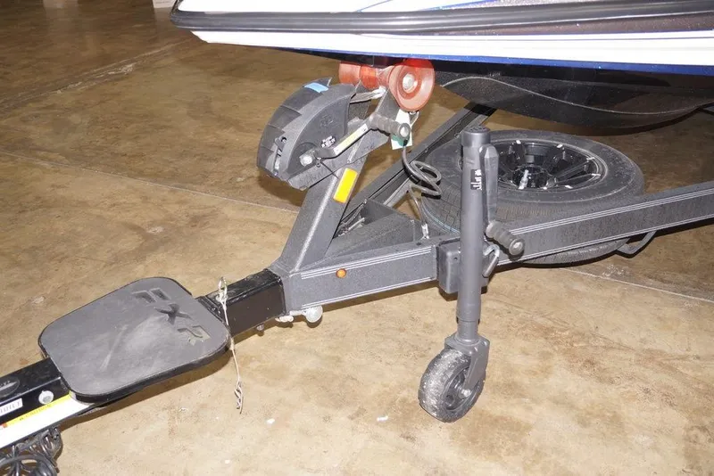 Slide: The Image of Trailer hitch of 2026 Skeeter FXR20 FLEX boat on concrete floor. - 4