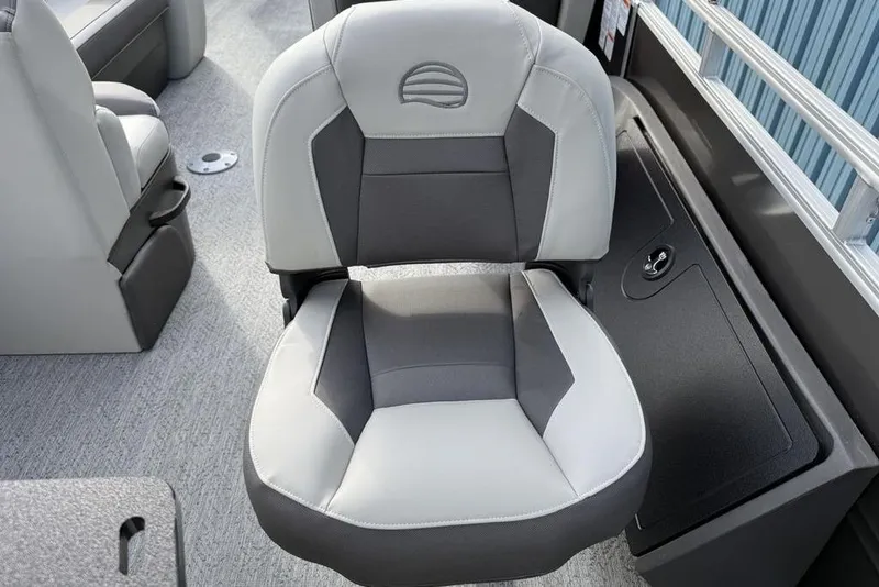 Slide: The Image of 2026 Sun Tracker Fishin' Barge 22 DLX boat seat, gray and black upholstery. - 26