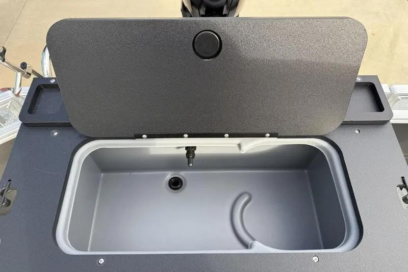 Slide: The Image of Livewell compartment on 2026 Sun Tracker Fishin' Barge 22 DLX pontoon boat. - 29