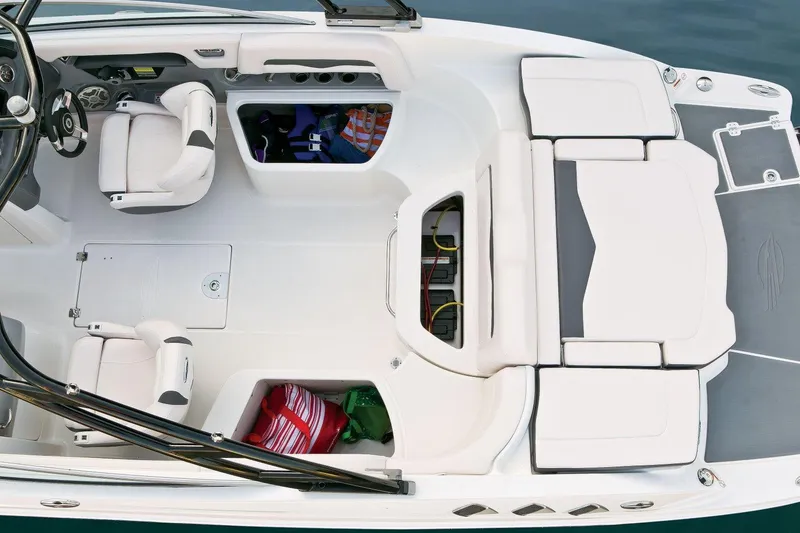 Slide: The Image of Manufacturer Provided Image: 2016 Chaparral 246 SSi boat interior with seating and storage compartments. - 12