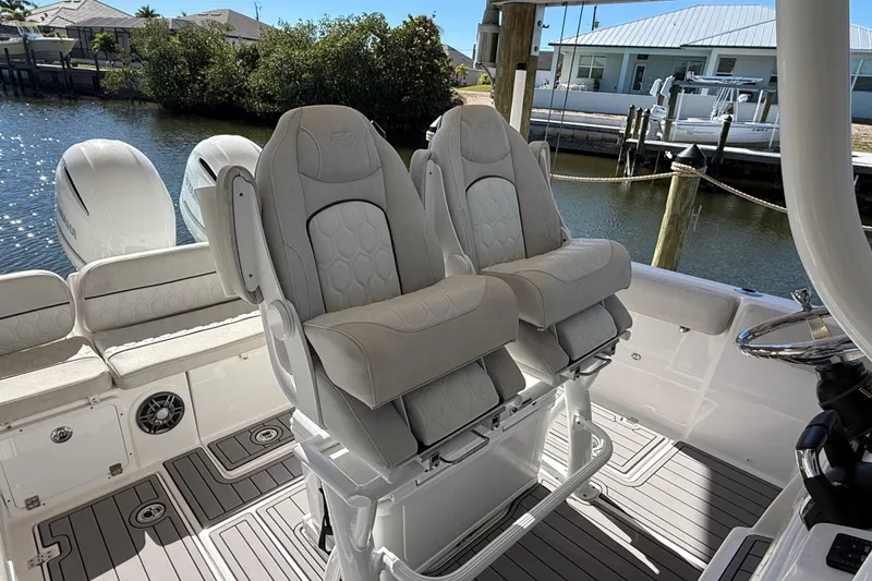Slide: The Image of 2023 Sea Fox 268 Commander boat interior with plush seating and modern design. - 11