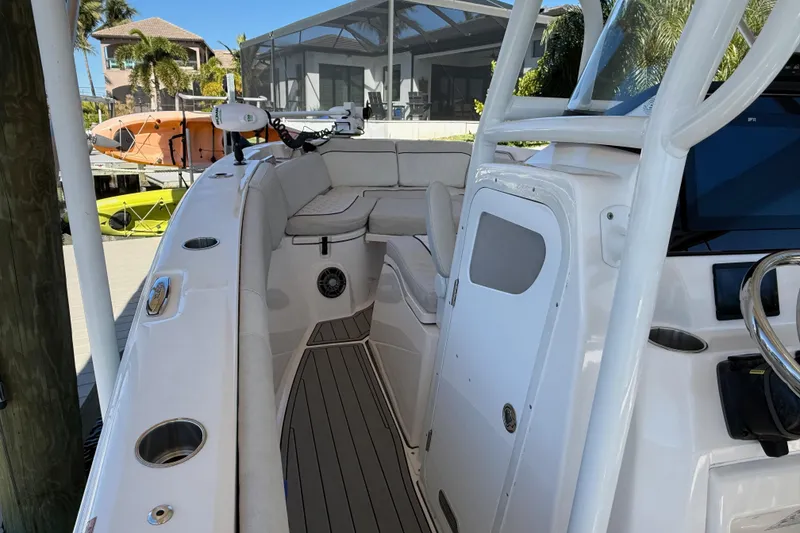 Slide: The Image of 2023 Sea Fox 268 Commander boat interior with seating and steering console. - 16