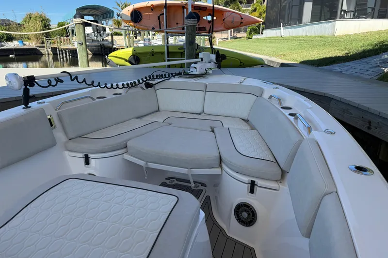 Slide: The Image of 2023 Sea Fox 268 Commander boat interior with cushioned seating and modern design. - 17