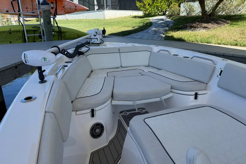 Slide: The Image of 2023 Sea Fox 268 Commander boat interior with cushioned seating and modern design. - 18