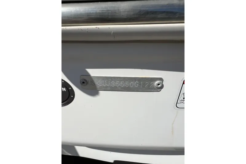 Slide: The Image of 2022 Tahoe T18 boat hull identification number plate. - 22