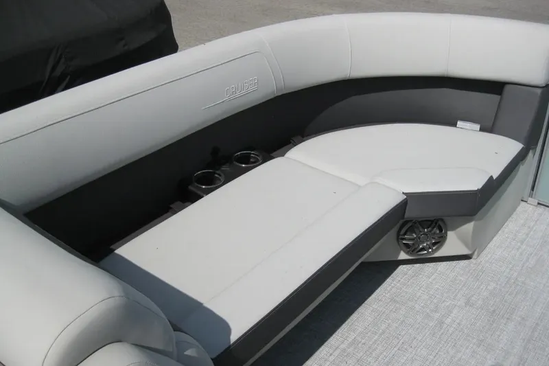 Slide: The Image of 2024 Harris FloteBote Cruiser 230 interior seating with cup holders and speaker. - 7