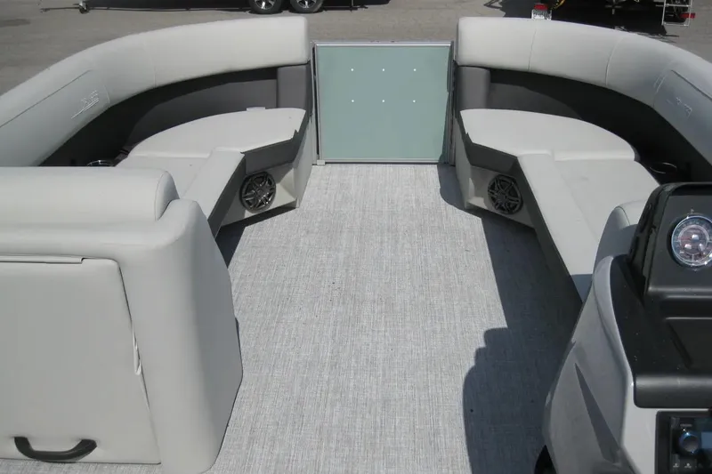 Slide: The Image of 2024 Harris FloteBote Cruiser 230 interior with spacious seating and modern design. - 9