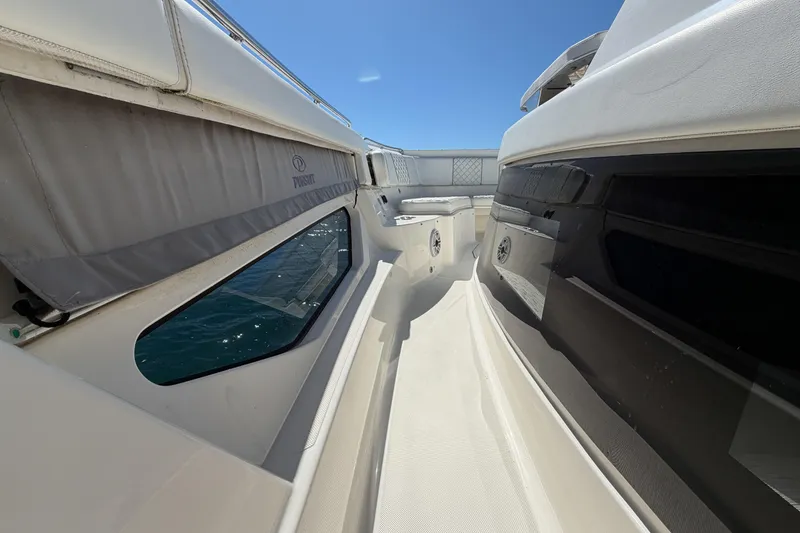 Slide: The Image of 2021 Pursuit S 378 Sport boat deck with sleek design and ocean view. - 26