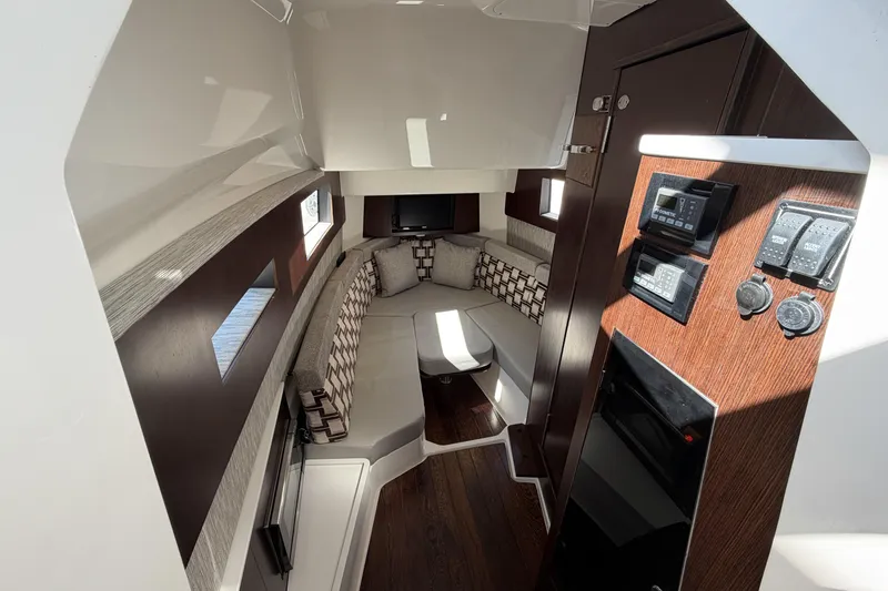 Slide: The Image of Luxurious interior of 2021 Pursuit S 378 Sport boat with modern amenities and seating. - 35