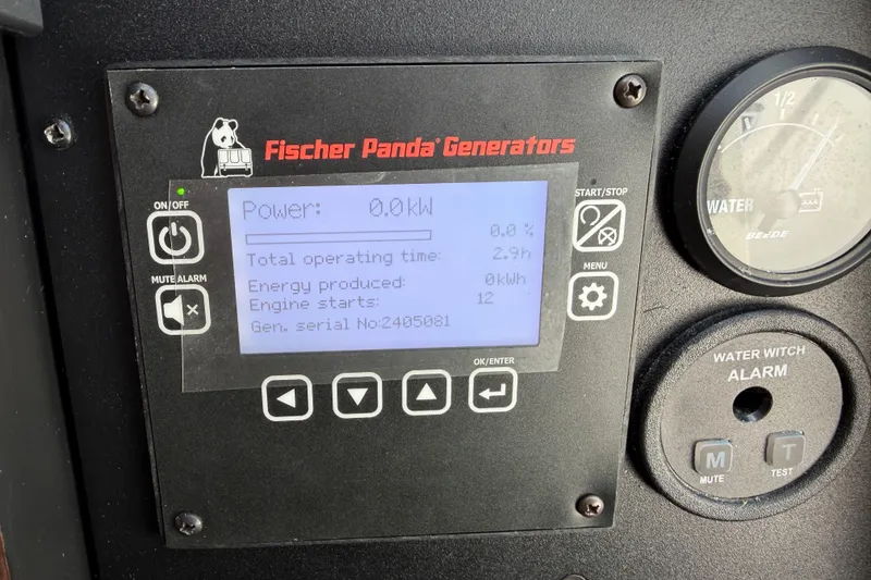 Slide: The Image of Fischer Panda generator display on 2021 Pursuit S 378 Sport boat dashboard. - 41