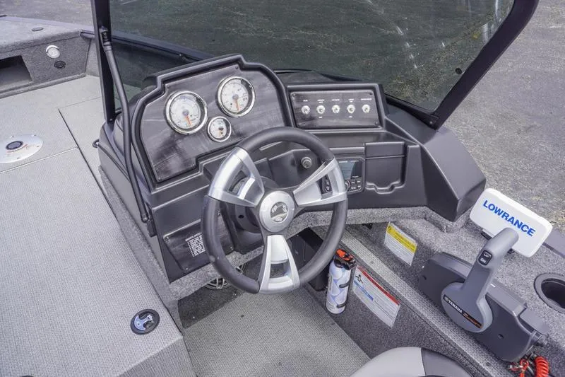 Slide: The Image of 2025 G3 Angler V178 F boat dashboard with steering wheel and control panel. - 11