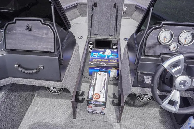 Slide: The Image of 2025 G3 Angler V178 F boat interior with storage compartments and steering wheel. - 13