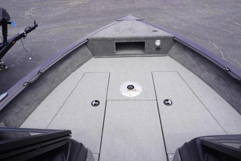 Slide: The Image of 2025 G3 Angler V178 F boat interior with storage compartments and carpeted deck. - 14