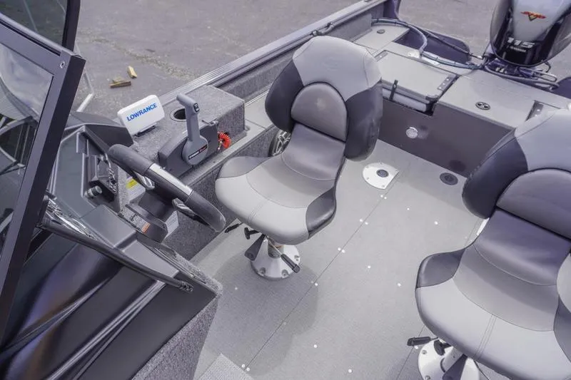 Slide: The Image of 2025 G3 Angler V178 F boat interior with steering wheel, seats, and control panel. - 19
