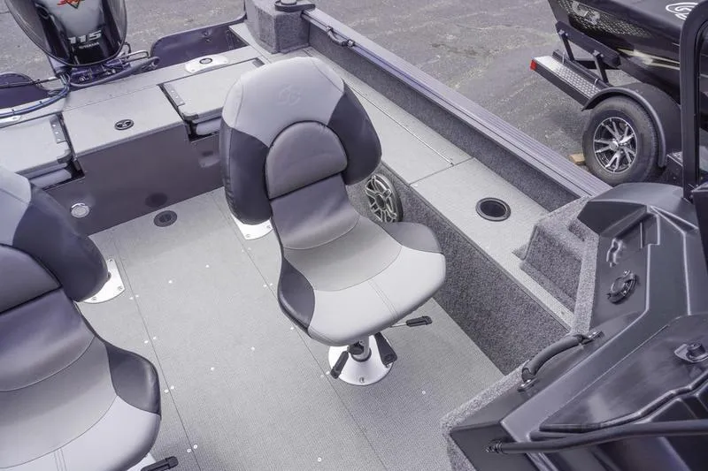 Slide: The Image of 2025 G3 Angler V178 F boat interior with swivel seats and motor. - 20