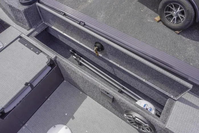 Slide: The Image of 2025 G3 Angler V178 F boat interior with open storage compartment and fishing rod holder. - 25