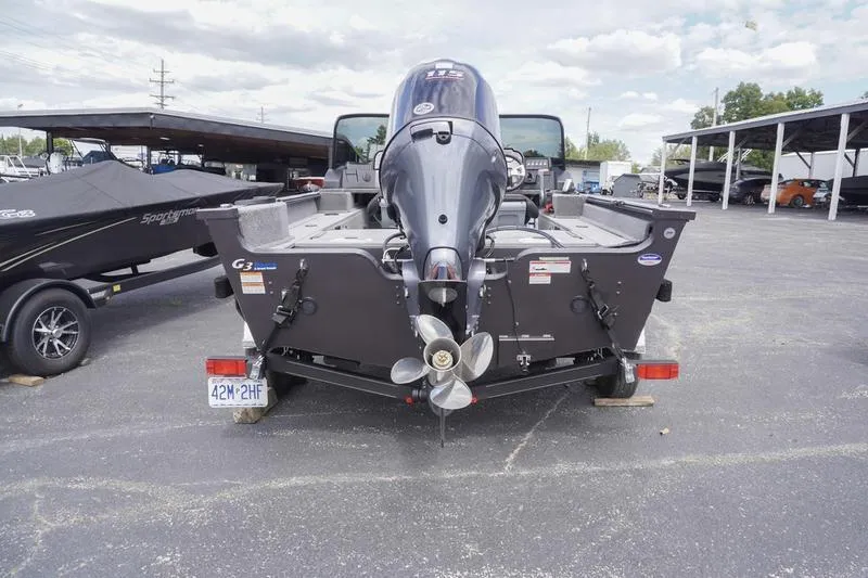 Slide: The Image of 2025 G3 Angler V178 F boat with outboard motor in parking lot. - 4