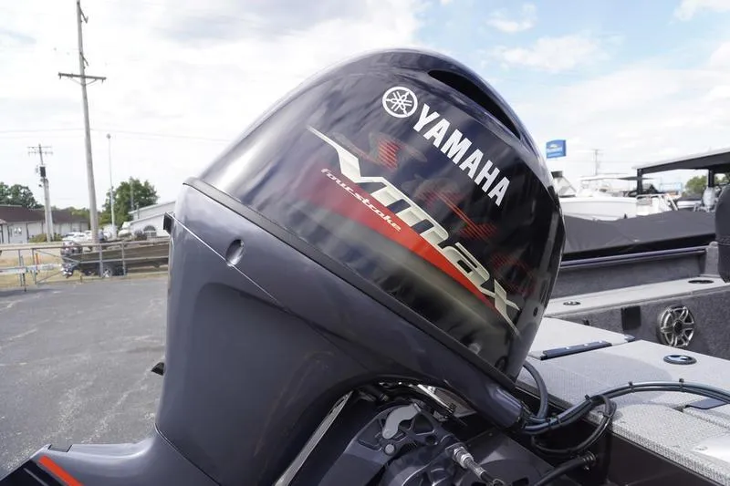 Slide: The Image of 2025 G3 Angler V178 F with Yamaha VMAX outboard motor, parked outdoors. - 6