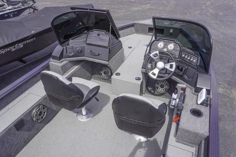 Slide: The Image of 2025 G3 Angler V178 F boat interior with dual seats and modern dashboard. - 7