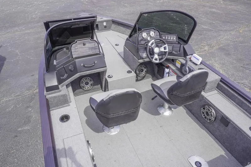 Slide: The Image of 2025 G3 Angler V178 F boat interior with dual seats and modern dashboard. - 8