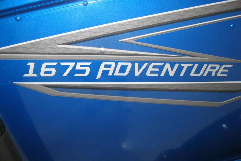 Slide: The Image of Blue 2025 Lund 1675 Adventure SS boat with bold logo. - 3